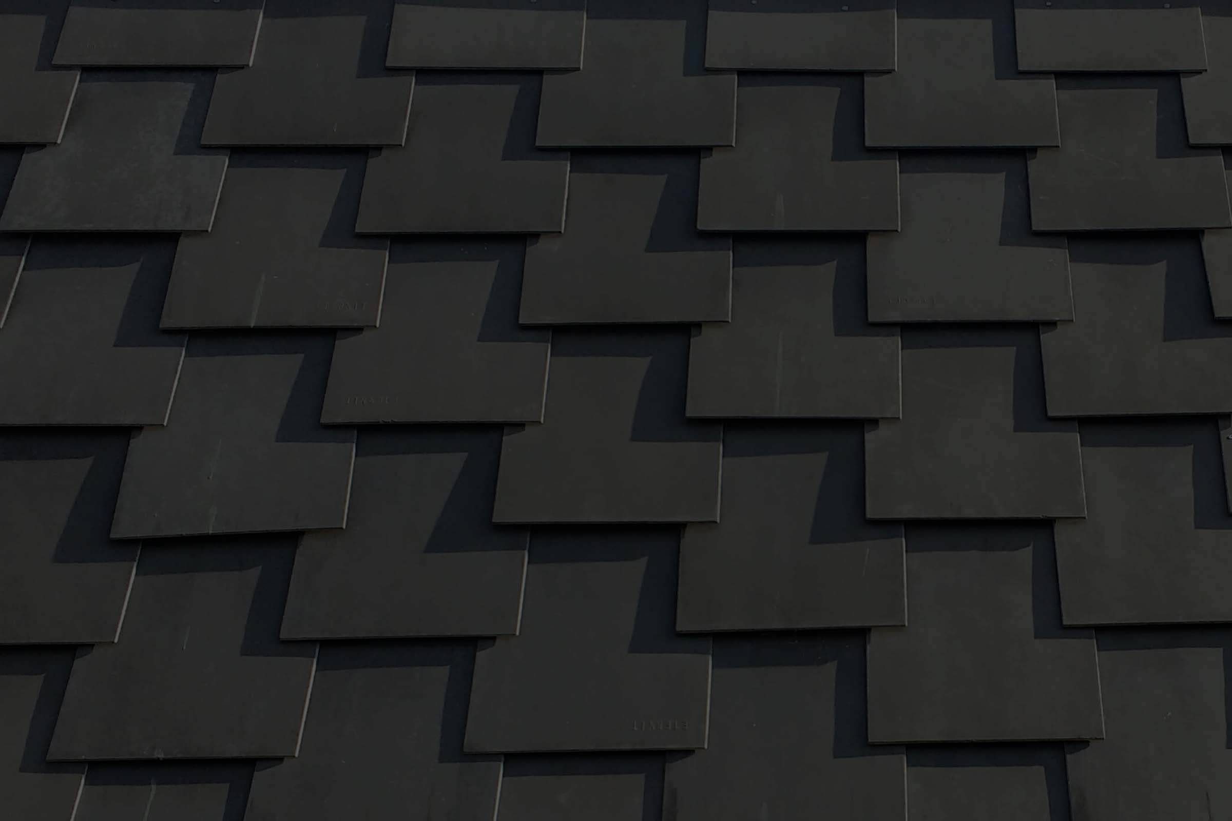 Metal tile roofing close up